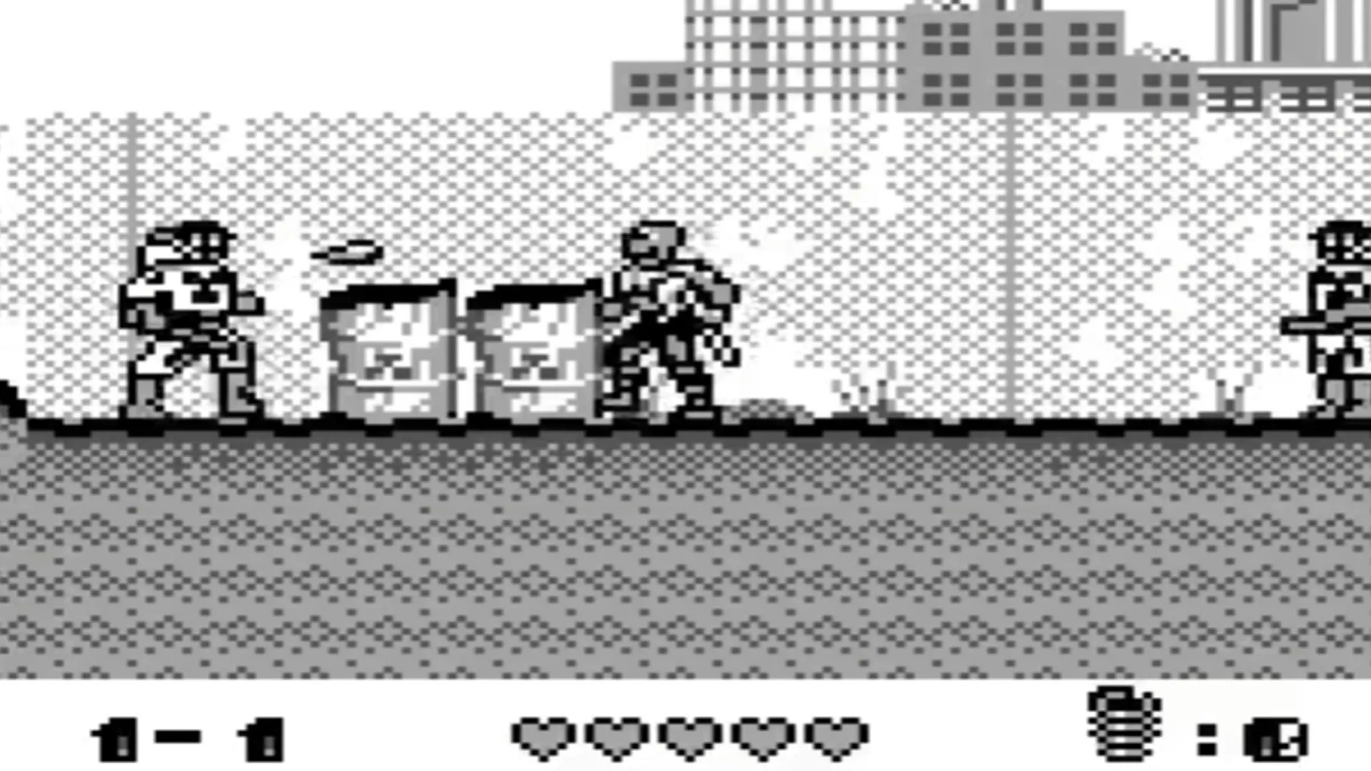 Ảnh chụp màn hình gameplay của game Toxic Crusaders trên Game Boy với nhân vật chính Toxie