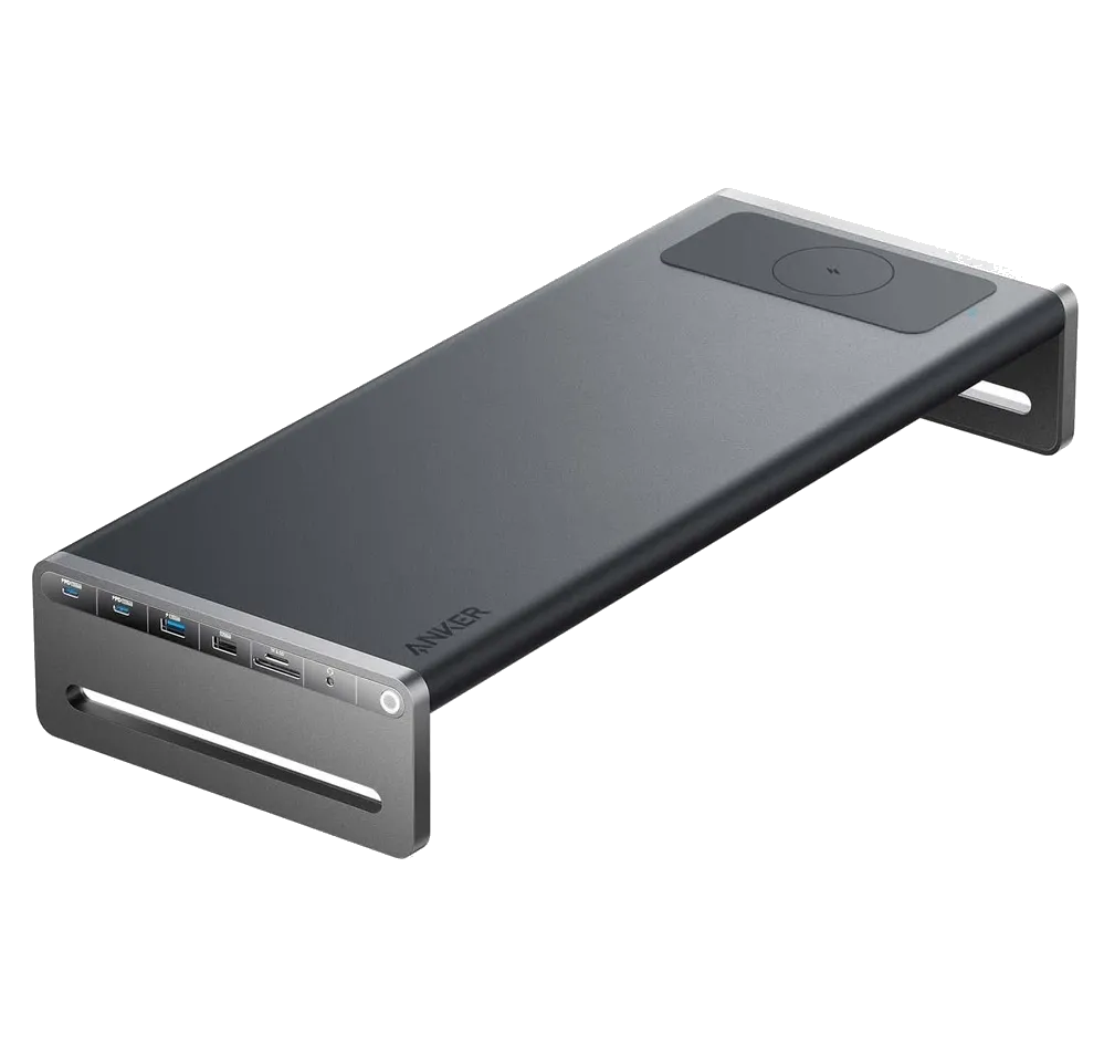 Anker 675 USB-C Docking Station màu đen đặt trên bàn làm việc, thể hiện thiết kế tích hợp giá đỡ màn hình.