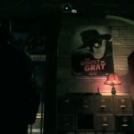 Batman đứng trên mái nhà cao, quan sát thành phố Gotham trong game Batman Arkham Knight, thể hiện thế giới mở rộng lớn và chi tiết.