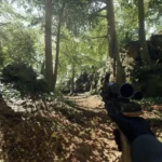 Cảnh chơi game Star Wars Battlefront 2 trên mặt trăng rừng rậm Endor, cho thấy thảm thực vật tươi tốt và căn cứ của Đế Chế.
