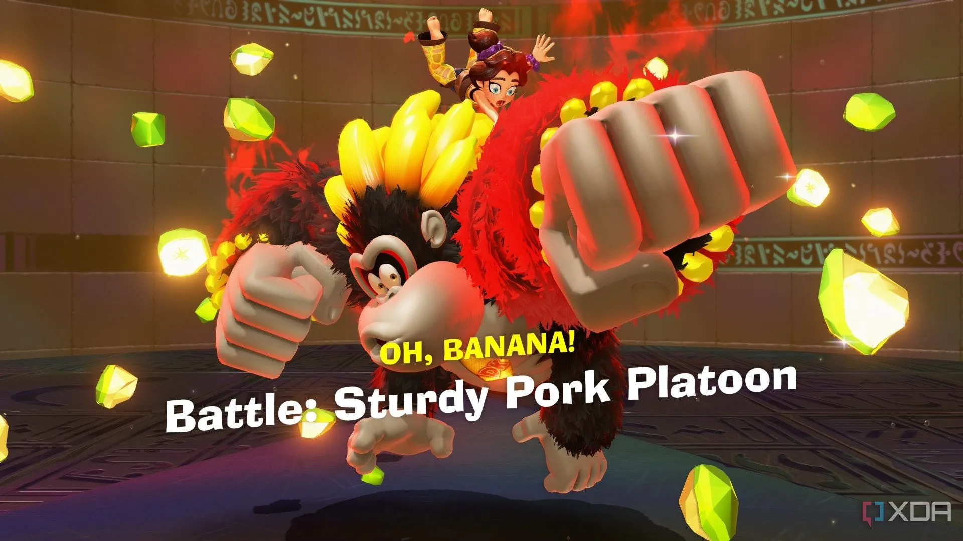 Donkey Kong ở dạng Bananza Form, đang tìm thấy một viên Banandium Gem quý giá, thể hiện cơ chế khám phá và thu thập trong Donkey Kong Bananza.