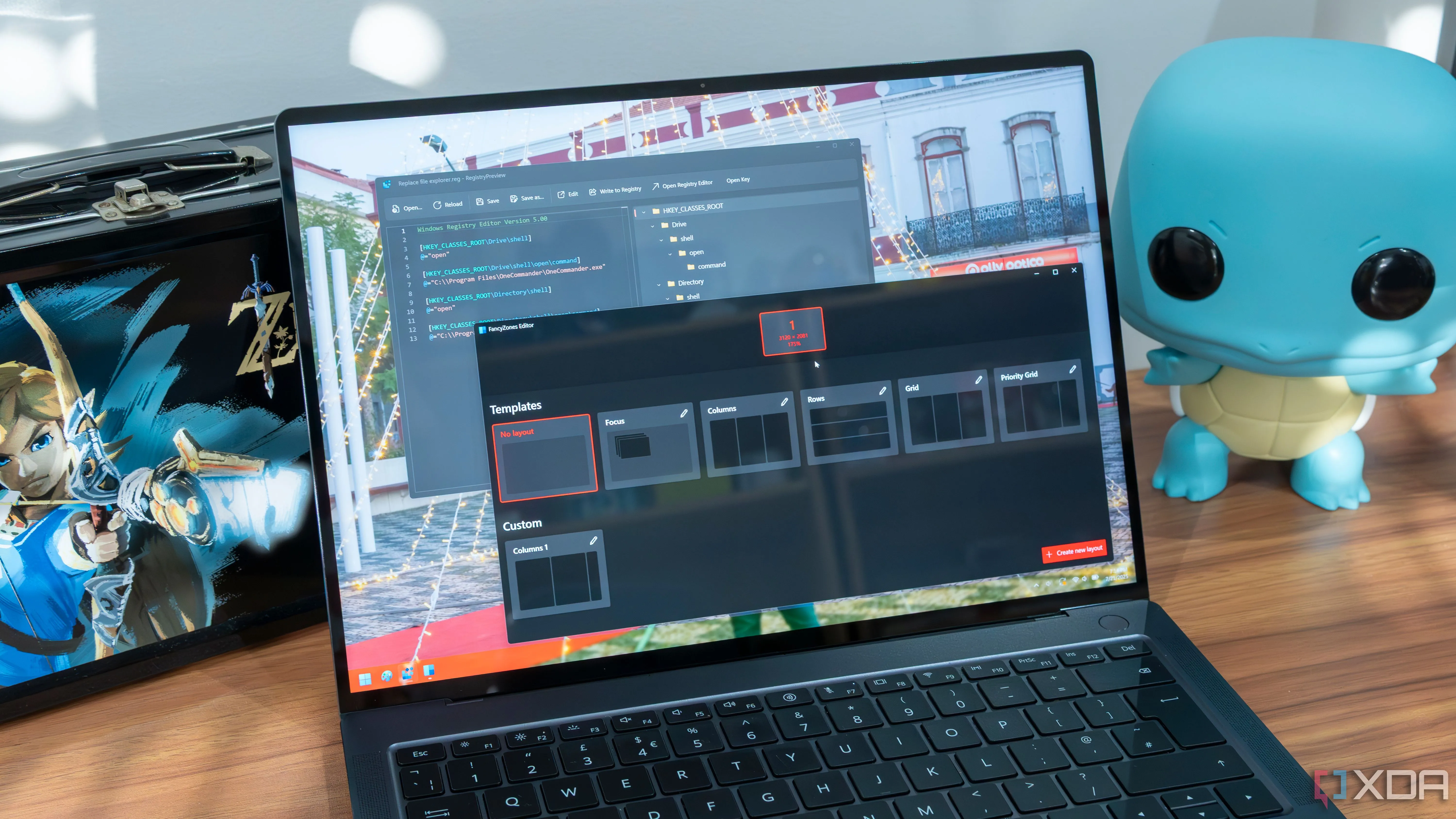 Giao diện Windows 11 hiển thị các công cụ PowerToys và cửa sổ Registry