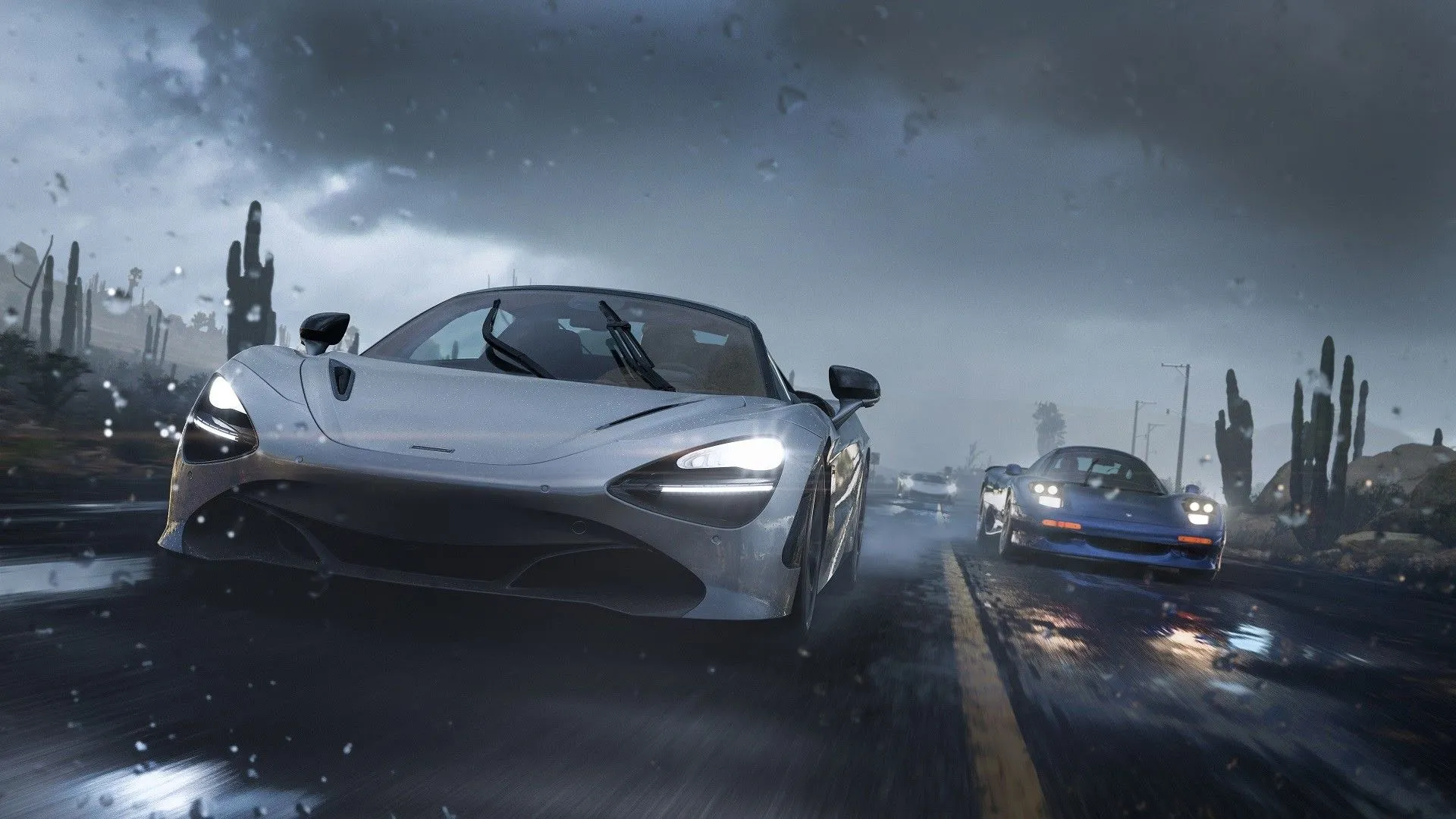 Hình ảnh các siêu xe đang đua trong Forza Horizon 5 dưới trời mưa lớn trên Steam Deck