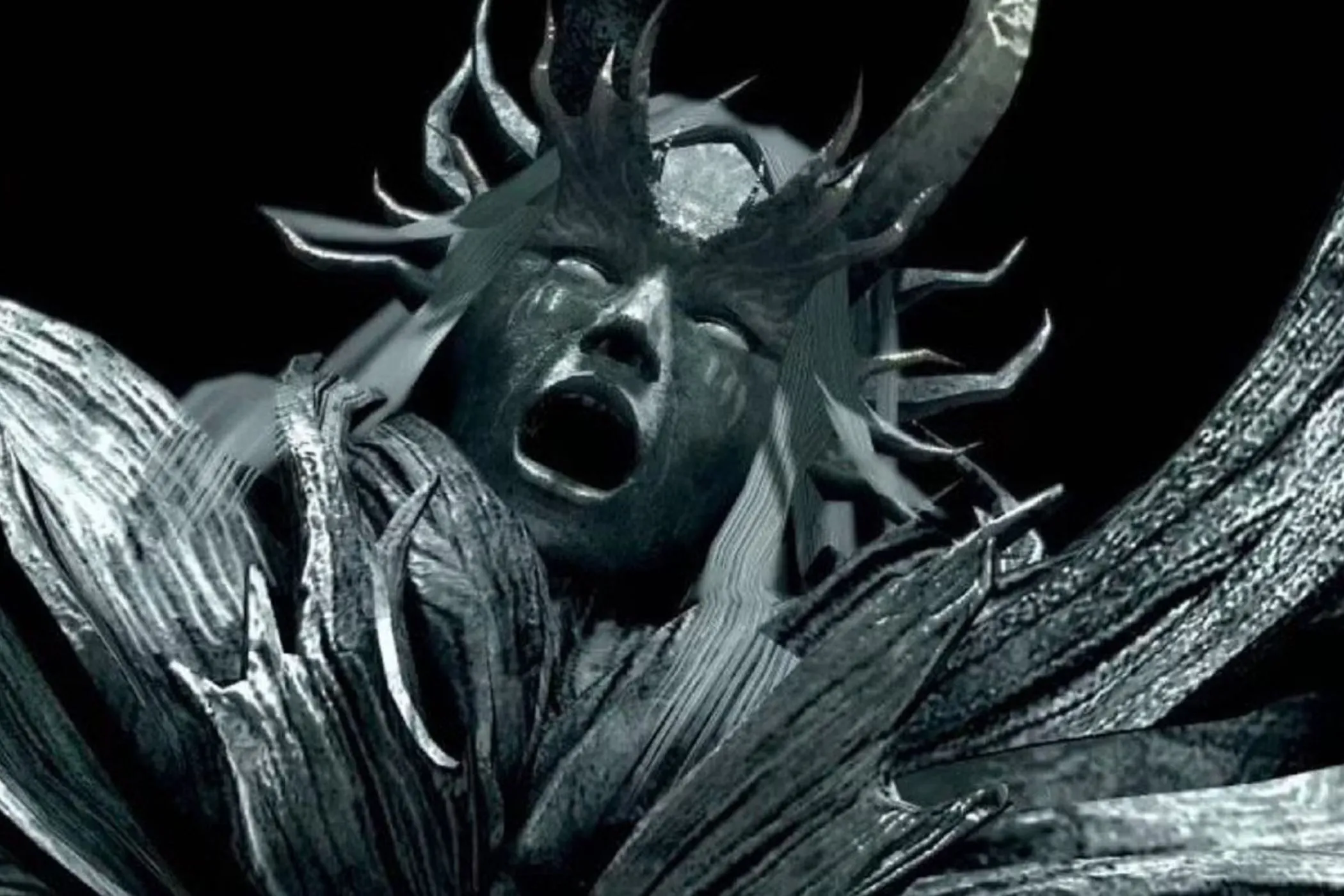 Hình ảnh The Four Kings, một trong những linh hồn quyền năng từ Dark Souls, đang lao vào người chơi trong vực thẳm Abyss tối tăm.