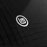 Màn hình Linux Mint với menu ứng dụng và giao diện Cinnamon quen thuộc, tương tự Windows.