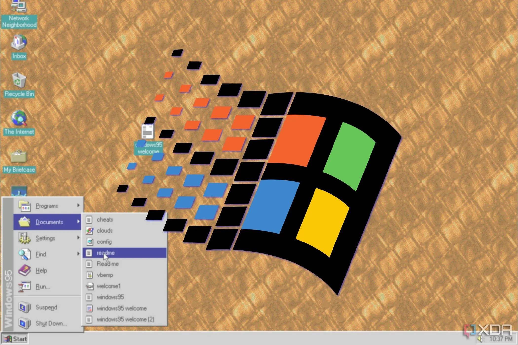 Máy tính để bàn Windows 95 với logo Windows 95 lớn, biểu tượng cho kỷ nguyên công nghệ