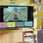 Người dùng trải nghiệm game Nintendo Switch 2 trên TV với giao diện GameChat