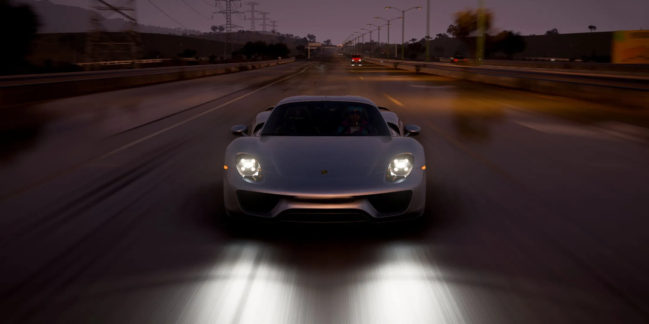 Xe thể thao Porsche 918 đang tăng tốc trên đường đua Forza Horizon 5